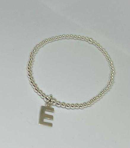 Sterling silver with E initial charm