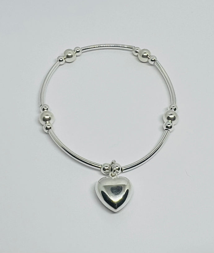 Sterling silver chunky spacer bracelet with chunky heart charm