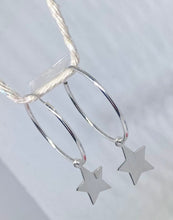 Sterling silver hoop earrings with drop star