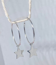 Sterling silver hoop earrings with drop star