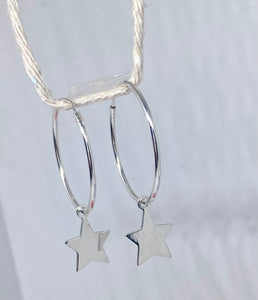 Sterling silver hoop earrings with drop star